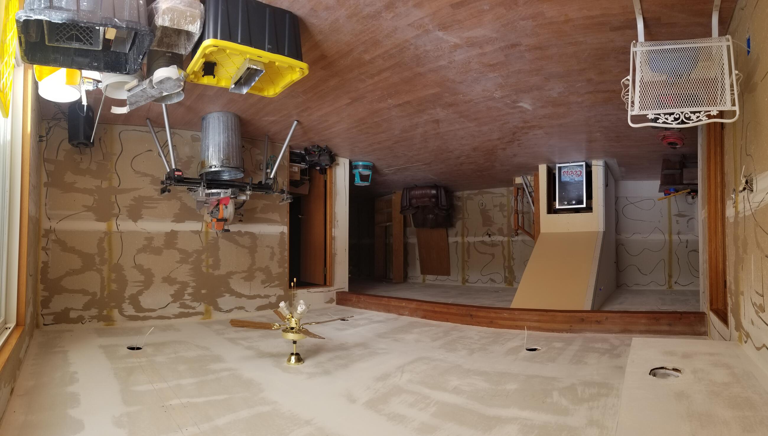 Before pic of the bar room of the basement