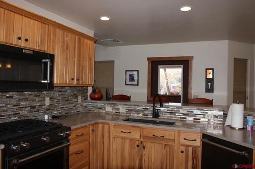 680 Cypress Wood Ln, Delta, Colorado - Kitchen Facing West